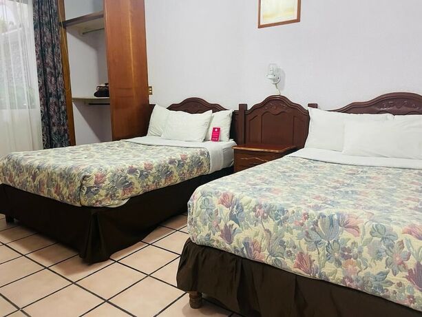 Imagen de la habitación del Hotel Posada La Fuente. Foto 20