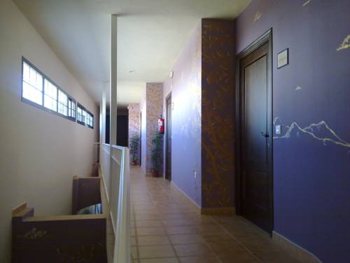 Imagen de la habitación del Hotel Posada Los Pedregales. Foto 5