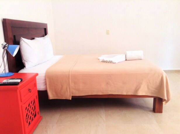 Imagen de la habitación del Hotel Posada Malix Pek. Foto 33