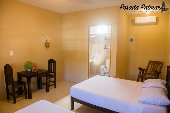 Imagen de la habitación del Hotel Posada Palmar. Foto 13