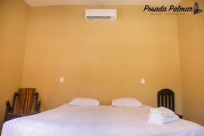 Imagen de la habitación del Hotel Posada Palmar. Foto 14