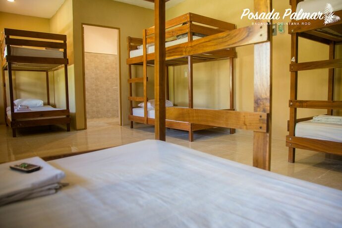 Imagen de la habitación del Hotel Posada Palmar. Foto 16