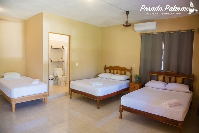 Imagen de la habitación del Hotel Posada Palmar. Foto 18