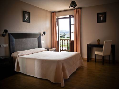 Imagen de la habitación del Hotel Posada Playa De Langre. Foto 4