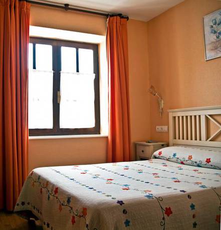 Imagen de la habitación del Hotel Posada Playa De Langre. Foto 6