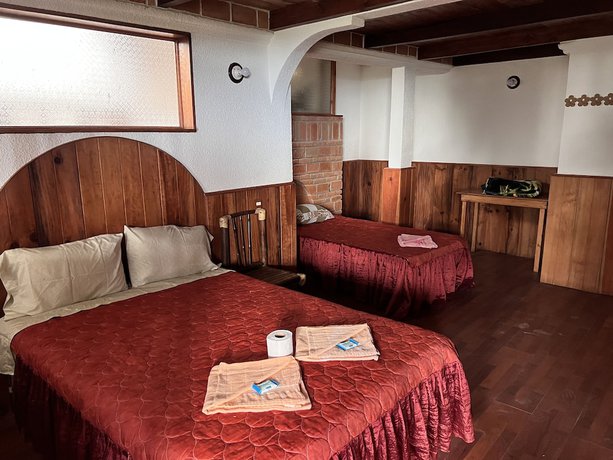 Imagen de la habitación del Hotel Posada Quetzalin. Foto 8