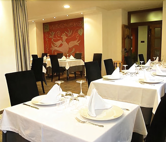 Imagen del bar/restaurante del Hotel Posada Real Abadia San Martin. Foto 4