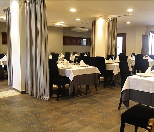 Imagen del bar/restaurante del Hotel Posada Real Abadia San Martin. Foto 5