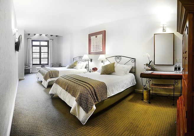 Imagen de la habitación del Hotel Posada Real De Chiapas. Foto 9