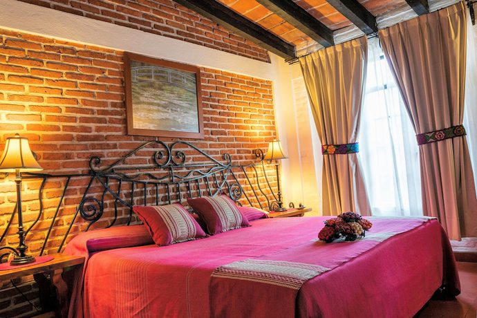 Imagen de la habitación del Hotel Posada San Angelo. Foto 12