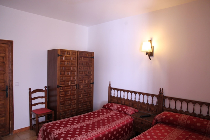 Imagen de la habitación del Hotel Posada San Julián. Foto 10