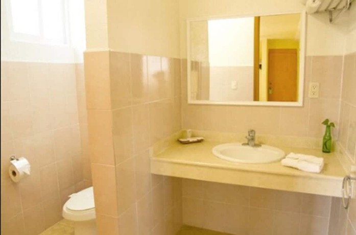 Imagen de la habitación del Hotel Posada Santa Bertha. Foto 11