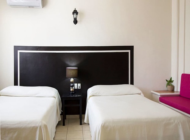 Imagen de la habitación del Hotel Posada Santa Clara. Foto 14