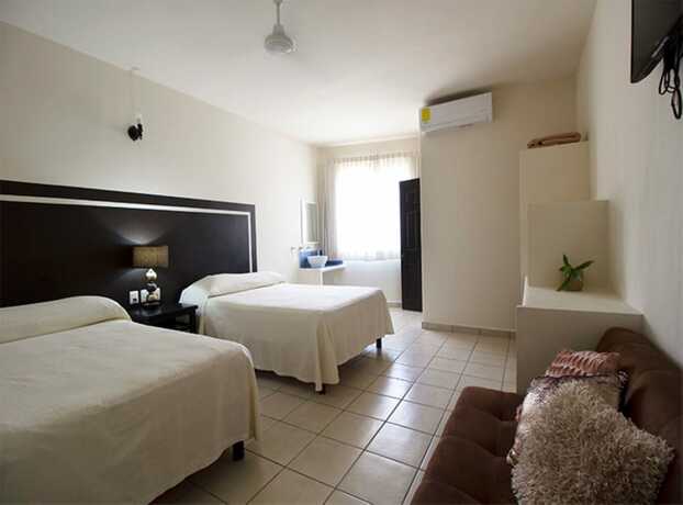 Imagen de la habitación del Hotel Posada Santa Clara. Foto 15