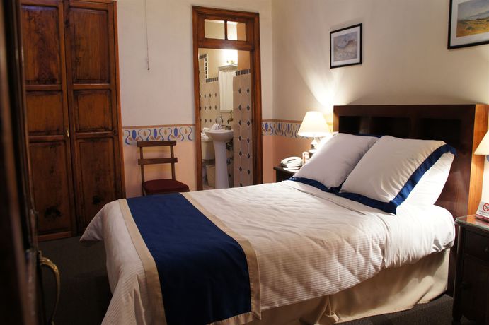 Imagen de la habitación del Hotel Posada Santa Fe. Foto 9