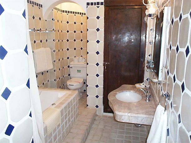 Imagen de la habitación del Hotel Posada Santa Fe. Foto 10