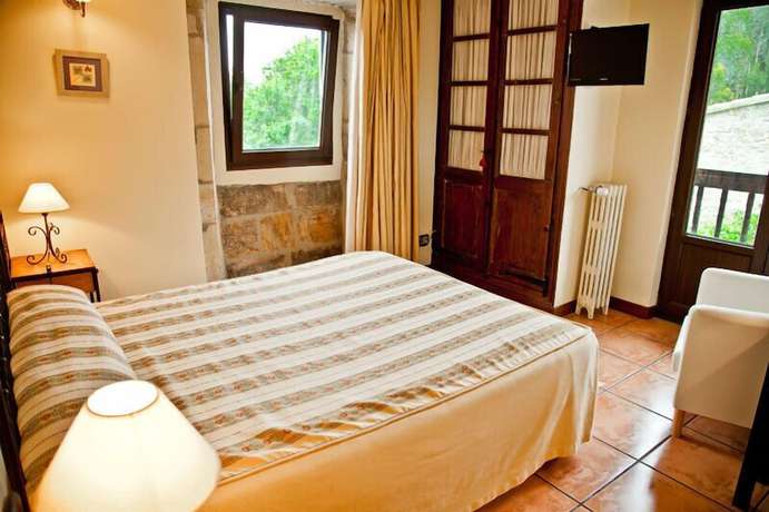 Imagen de la habitación del Hotel Posada Somavilla. Foto 8