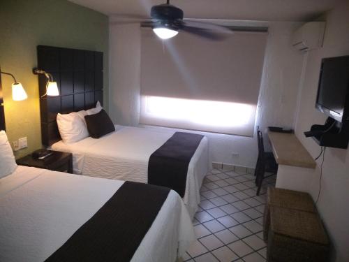 Imagen de la habitación del Hotel Posada Terranova. Foto 6