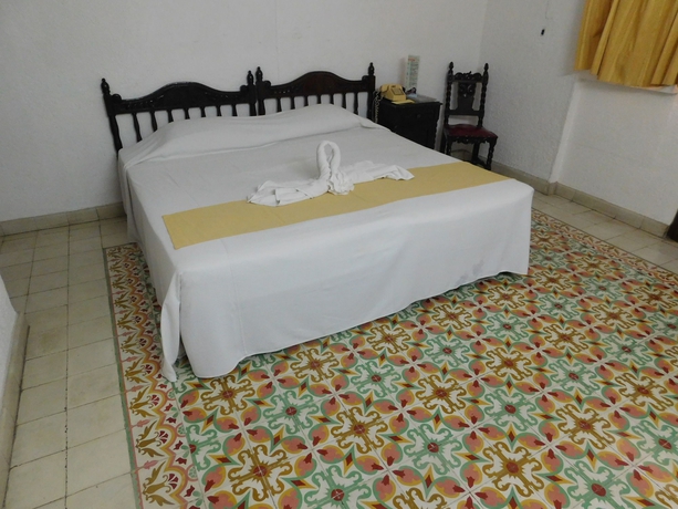 Imagen de la habitación del Hotel Posada Toledo. Foto 8