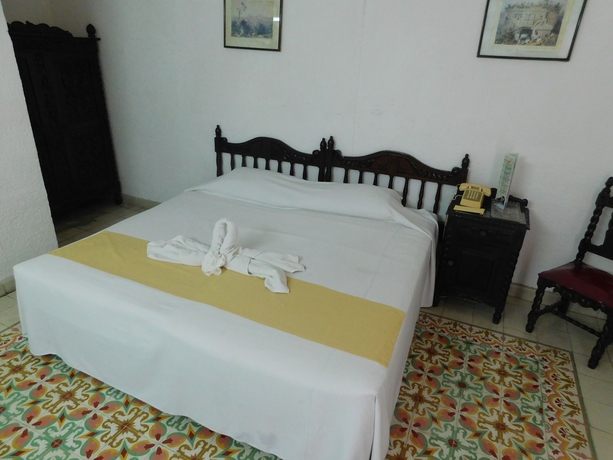 Imagen de la habitación del Hotel Posada Toledo. Foto 9