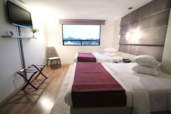 Imagen de la habitación del Hotel Posada Tulancingo. Foto 12