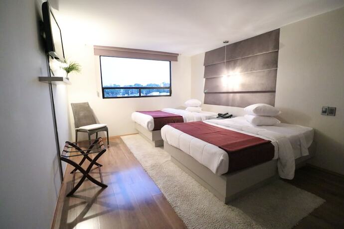 Imagen de la habitación del Hotel Posada Tulancingo. Foto 13