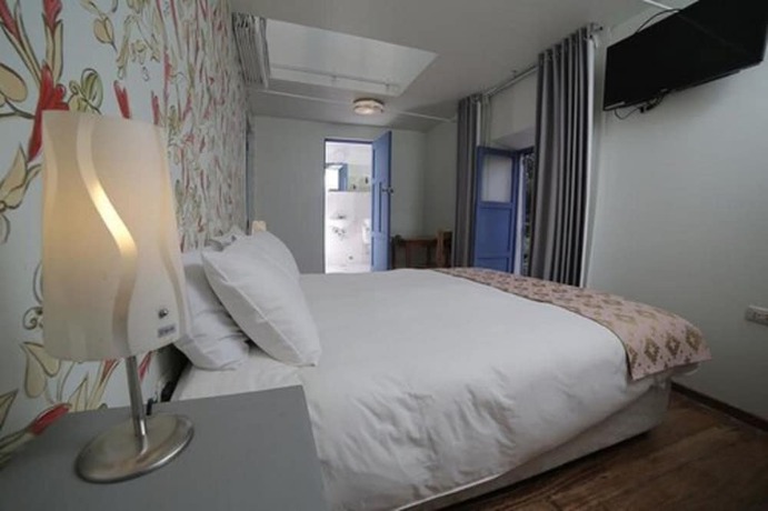 Imagen de la habitación del Hotel Posada Villa Mayor. Foto 17