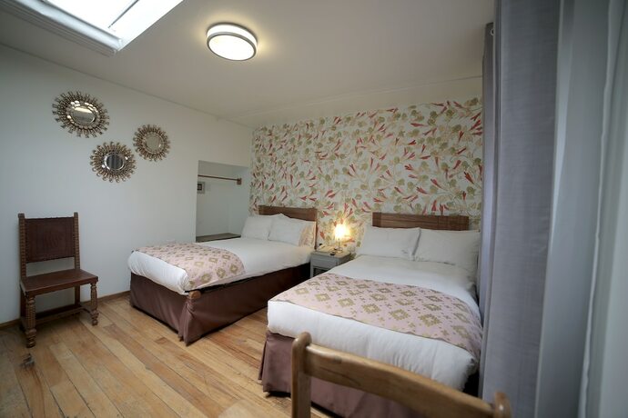 Imagen de la habitación del Hotel Posada Villa Mayor. Foto 22