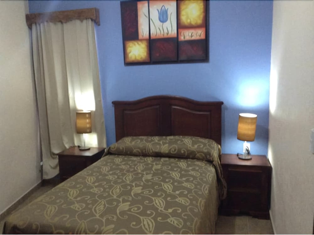 Imagen de la habitación del Hotel Posada Y Bungalows La Capilla. Foto 4