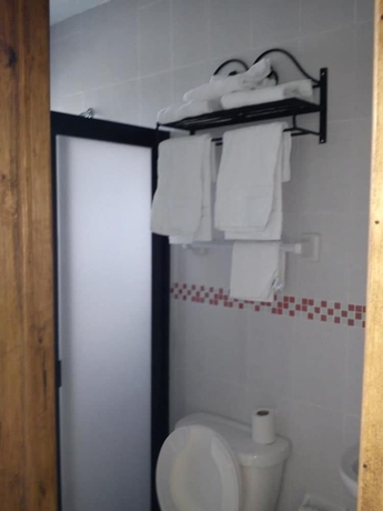 Imagen de la habitación del Hotel Posada Y Bungalows La Capilla. Foto 6