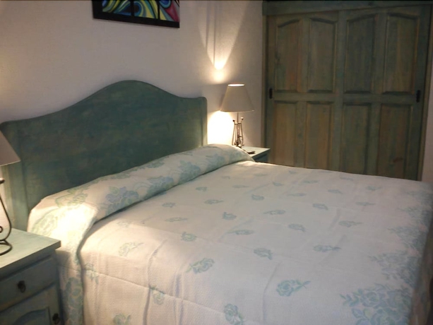 Imagen de la habitación del Hotel Posada Y Bungalows La Capilla. Foto 7