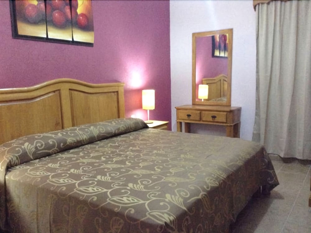 Imagen de la habitación del Hotel Posada Y Bungalows La Capilla. Foto 8