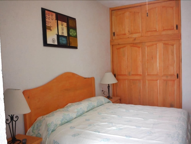 Imagen de la habitación del Hotel Posada Y Bungalows La Capilla. Foto 9