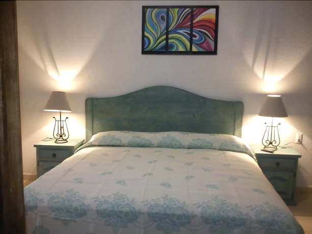 Imagen de la habitación del Hotel Posada Y Bungalows La Capilla. Foto 10