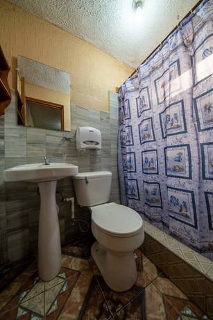 Imagen de la habitación del Hotel Posada de Papa Miro. Foto 4