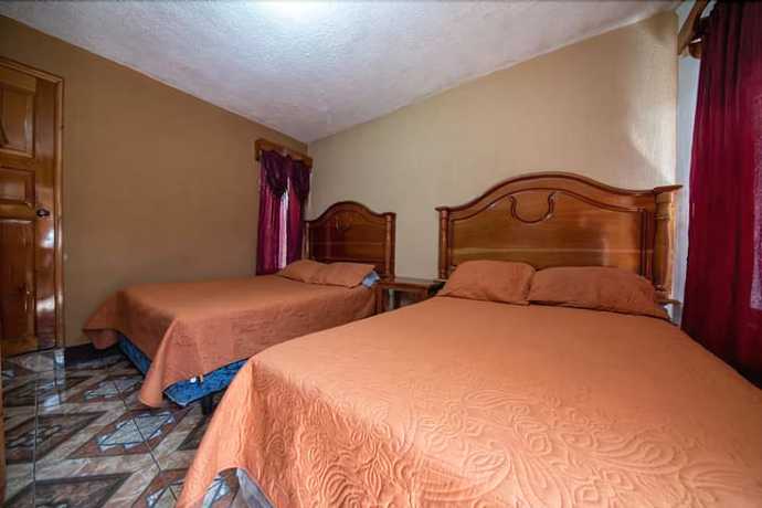 Imagen de la habitación del Hotel Posada de Papa Miro. Foto 9