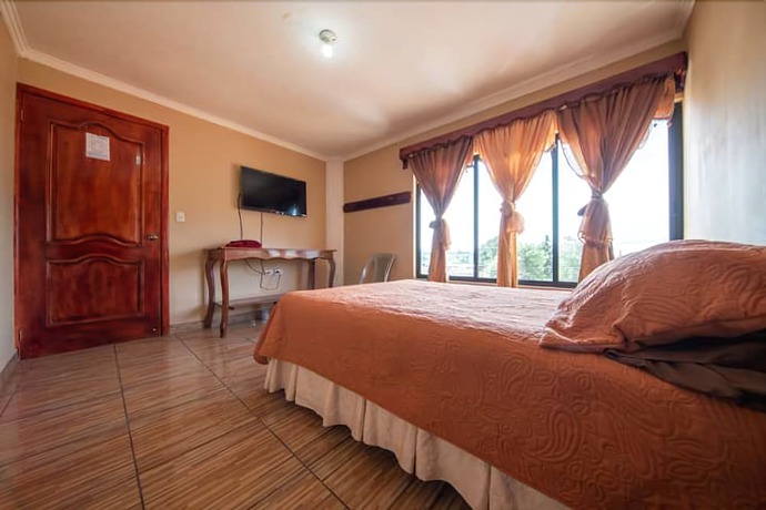 Imagen de la habitación del Hotel Posada de Papa Miro. Foto 12