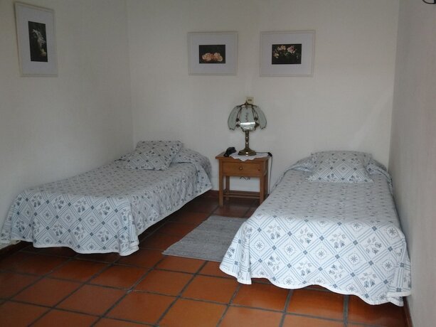 Imagen de la habitación del Hotel Posada de la Flor. Foto 18