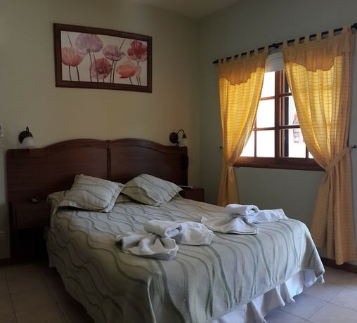 Imagen de la habitación del Hotel Posada del Infinito. Foto 11