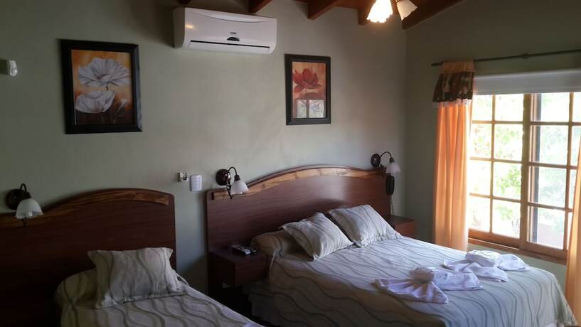 Imagen de la habitación del Hotel Posada del Infinito. Foto 14