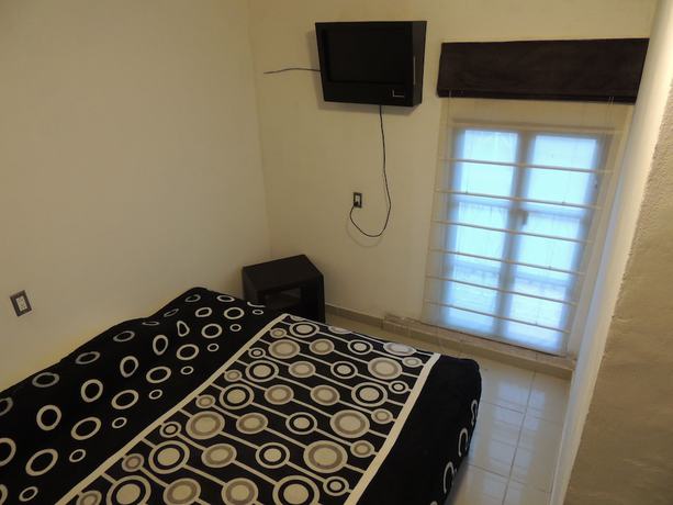 Imagen de la habitación del Hotel Posada la Sierra. Foto 7