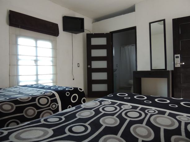 Imagen de la habitación del Hotel Posada la Sierra. Foto 8