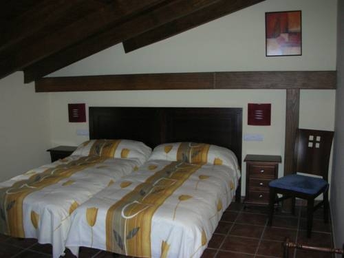 Imagen de la habitación del Hotel Posada los Guilos. Foto 11