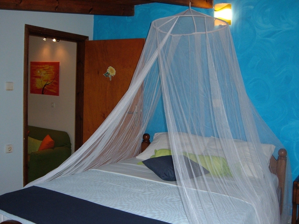 Imagen de la habitación del Hotel Poseidon Apartments. Foto 12