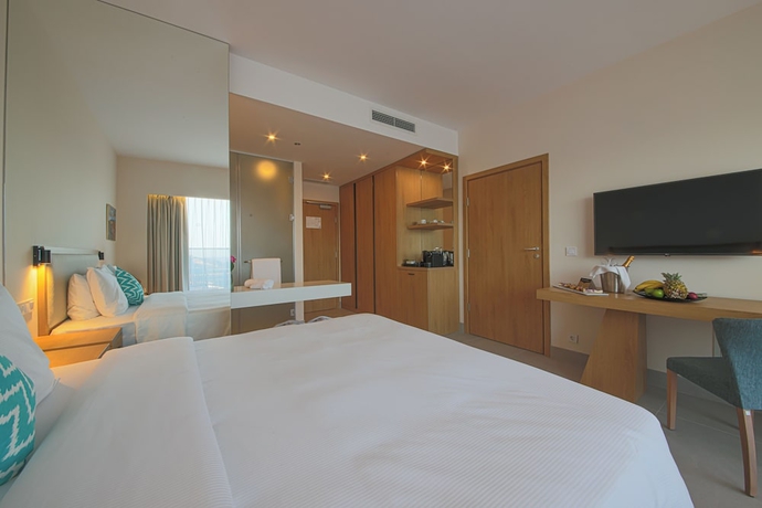 Imagen de la habitación del Hotel Poseidon Beach Resort. Foto 8