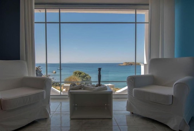 Imagen de la habitación del Hotel Poseidon Beach Villas. Foto 12