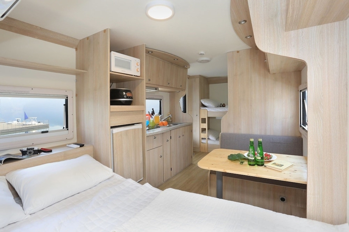 Imagen de la habitación del Hotel Poseidon Caravan - Campsite. Foto 11