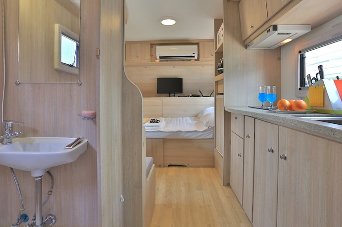 Imagen de la habitación del Hotel Poseidon Caravan - Campsite. Foto 16