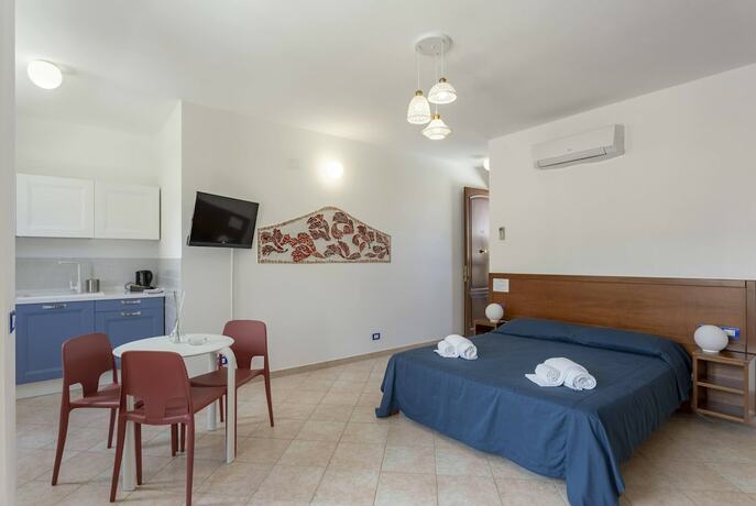 Imagen de la habitación del Hotel Poseidon Residence. Foto 14