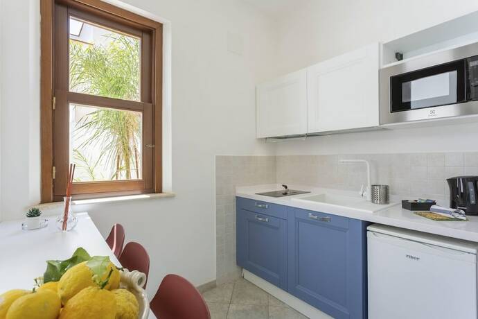 Imagen de la habitación del Hotel Poseidon Residence. Foto 19